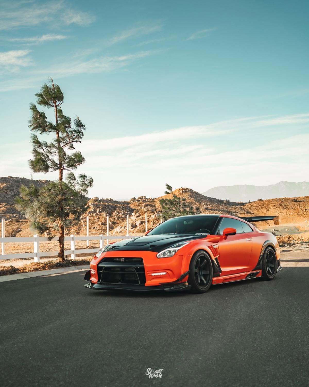 Orange performance car photographed for Valenz Auto Body